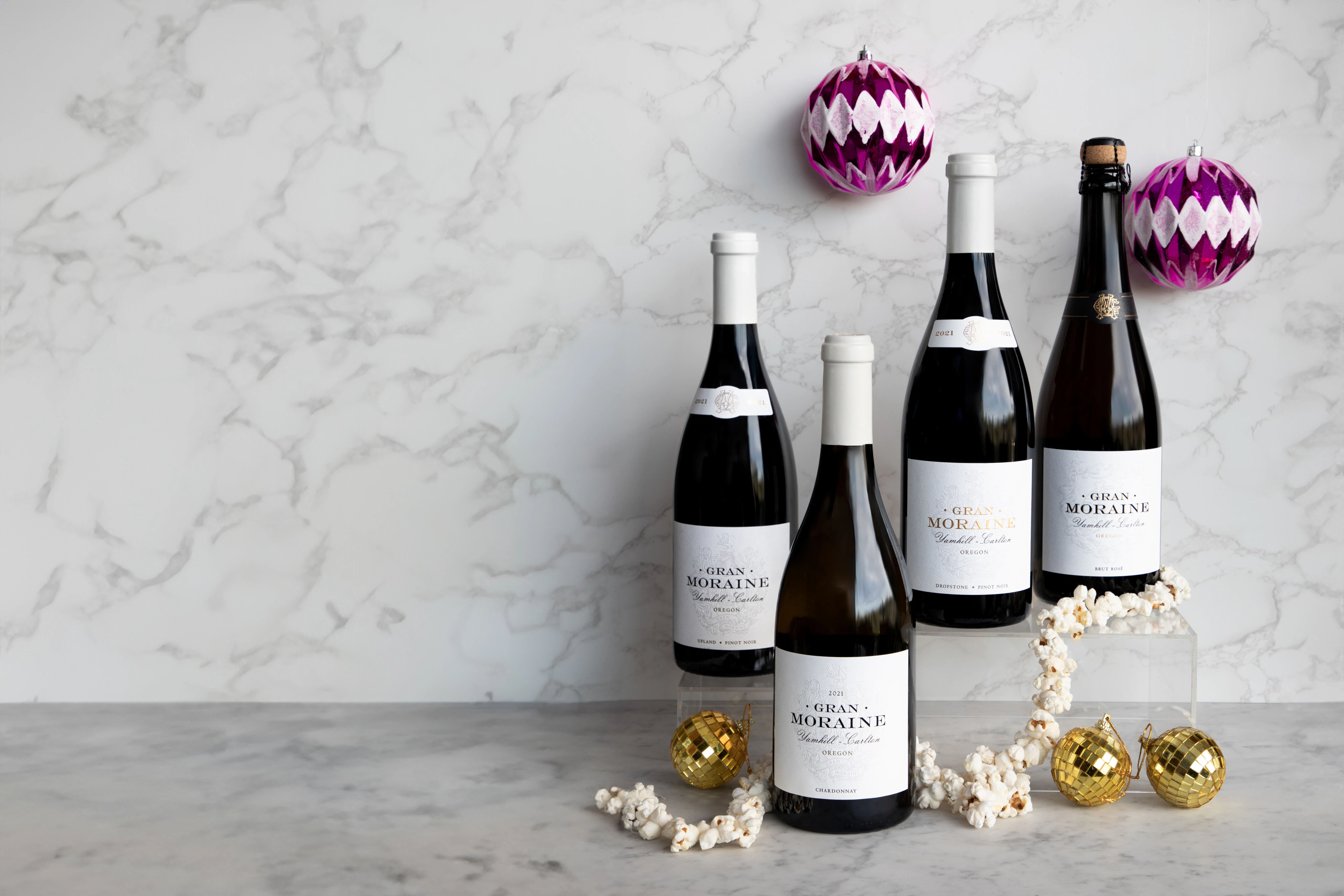 Wine bottles with holiday decor